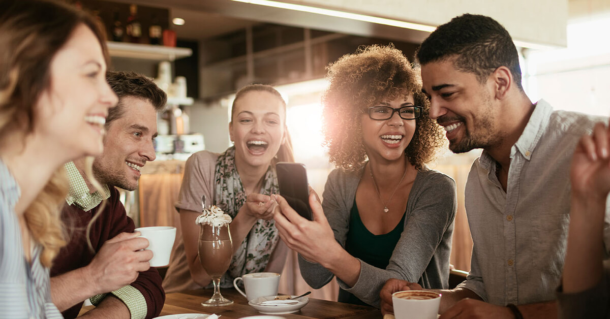 happy people in coffee shop