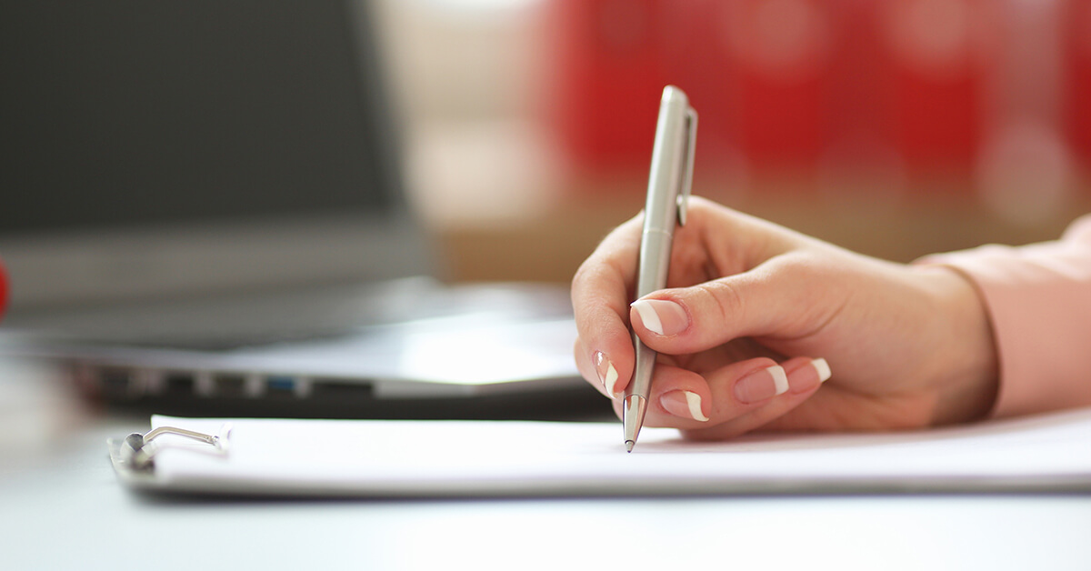 woman's hand writing